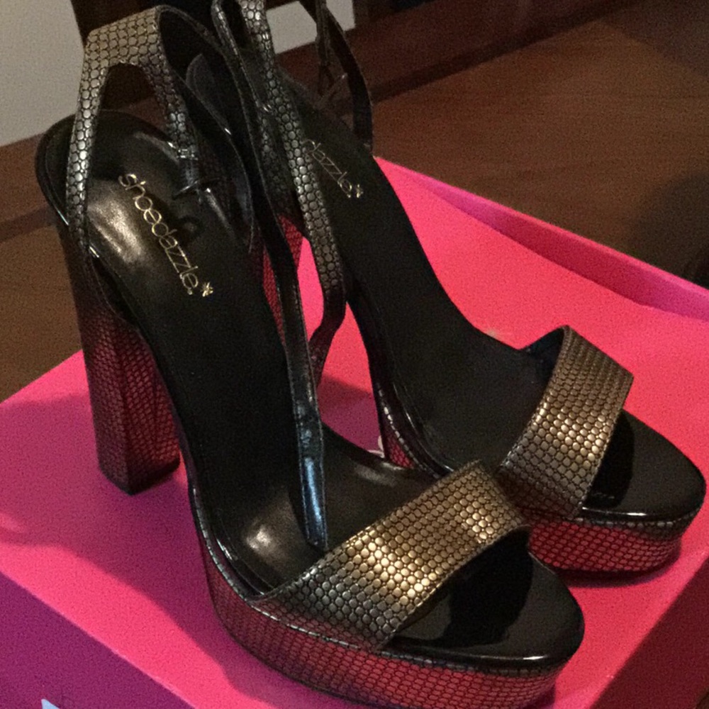 Gold and black heels